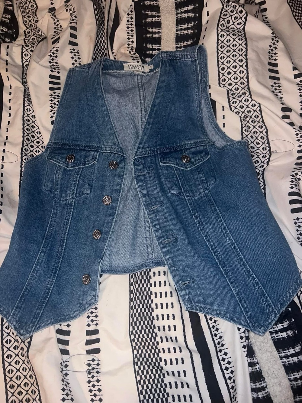 Molly Bracken size small denim vest.